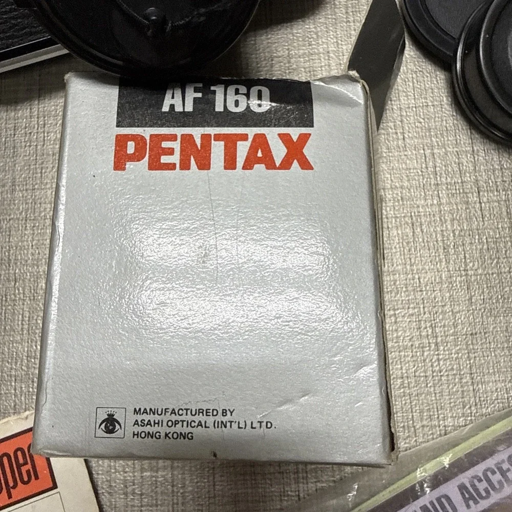 Pentax ME Super 35mm SLR Film Camera with 50 mm lens And Pentax Flash Extras Lot